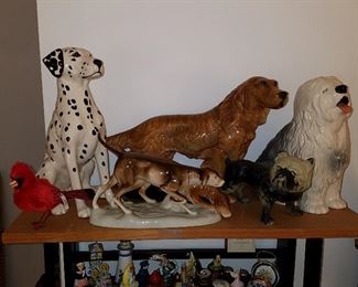Red Cardinal by Steiff, Dalmatian & Sheepdog by Beswick, Setters (in front) by Royal Dux, back setter is Marwan. Bull dog is cast iron (newer). 
