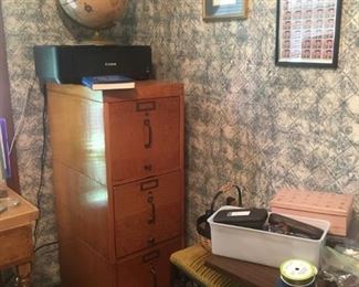 Canon printer, wood file cabinet, globe