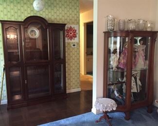 Curio cabinets and doll clooection