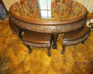 Ornate carved Chinese Coffee table with 6 stools