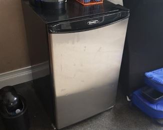 Dorm size refrigerator with tiny freezer compartment