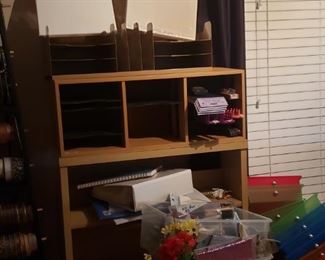 Craft organizers and unopened paint canvases