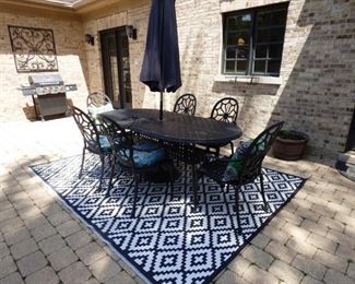 Wrought Iron Patio Set with 6 chairs and Umbrella.  Outdoor rug