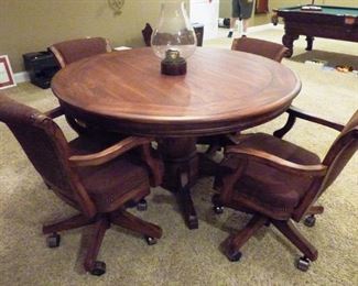 Available for Presale---$1975.00                                  
                 Signed Mikhail Darafeev "Algonquin" Classic 54" Poker/Game/DR/Kitchen Table. Perfect size for smaller spaces. Comes with 4 Adjustable "classic" game chairs on rollers. Poker table will seat 8 player&nbsp; &nbsp; &nbsp; positions.Game top flips over to reveal solid top game table or Kitchen/DR table(Original Price over $7000