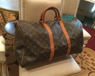  Two of three Louis Vuitton Keepall