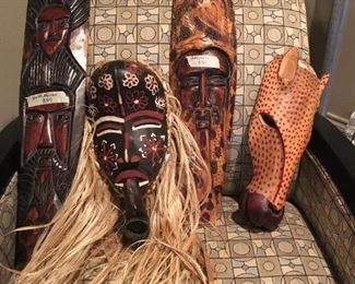 Hand carved masks from South Africa  and Kenya