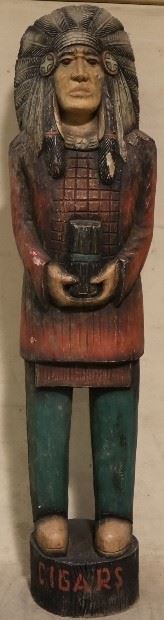 Tall carved wooden Indian