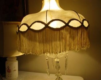 Crystal lamp with shade.  Shade is very bad condition.  Liner tears very easy.  Beautiful to look at.  