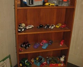 toys, model cars, bookcase