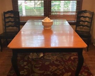 Nice Oak table with black painted accents.   Great condition.