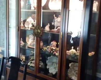 Stunning excellent condition all furniture! Beautiful Asian coffee table, buffet, dining room table with 4 chairs( this is a narrower oval table than most) China cabinet and beautiful  corner curio, vintage sofa with butterfly print and 2 wing back chairs. These two rooms were barely used.