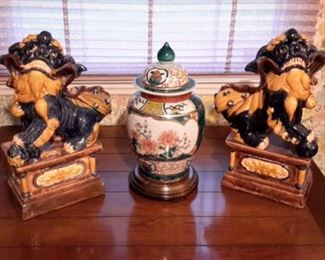 Two heavy ceramic fu dogs and beautiful urn.