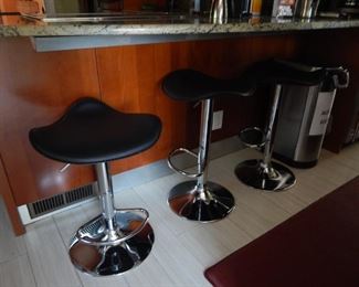 Kitchen stools. They are nice because they don't take a lot of room and they rise up and down to accommodate any height counter.
