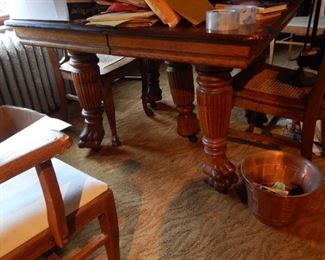 Antique Oak table with three leaves, six chairs.