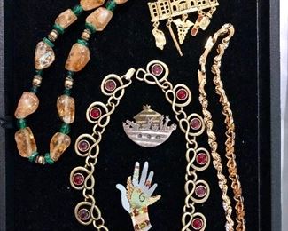 Swarovski necklace, pins, and fashion jewelry
