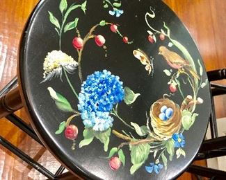 Detail of design on 3 stools birds, butterflies, flowers