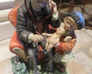 Vintage Capodimonte Porcelain Doctor with Baby Girl
