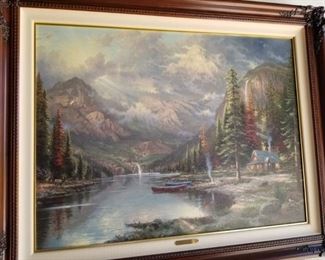 Signed Thomas Kinkade  painting mounted and framed.  This will be brought looked @ early by art lovers