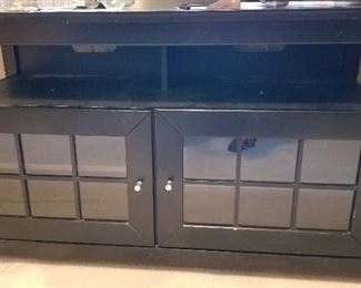 Contemporary black TV/media stand.  Heavy, great condition!