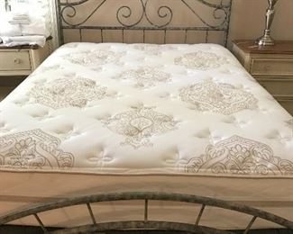 Like new queen mattress and box springs   I have 2 to sell   Lots of linens etc!  Great headboard