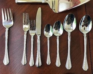2 nice sets of stainless flatware