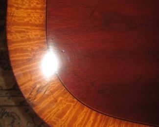 DETAIL OF RIM OF DINING ROOM TABLE