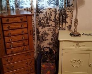 Jewelry armoire and one of two bedside cabinets