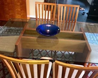 GORGEOUS WORKBENCH MODERN GLASS TOP DINING TABLE W/8 CHAIRS. MINOR CHIP ON EDGE 72" LENGTH X 42" WIDTH X 29" HEIGHT 