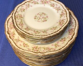 Antique [c. 1903, per Google search] Limoges Porcelain: 10 Salad Plates & 5 Saucers: 
8 ½” Salad Plates with Pink Floral Design (10)6 ¼” Matching Saucers (5) [1 slightly chipped]
Mark on back: “Théodore Haviland Limoges FRANCE Patent applied for”	[15 pcs]


