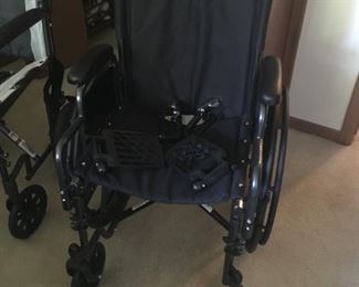 . . . practically new wheel chair.