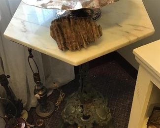 Vintage Cast iron base marble top table, lamps, shells, etc.