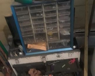 Tool box and chest filled with parts