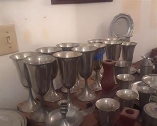 Pewter goblets and other serving pieces
