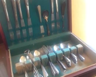 Set of silverware in chest, plated