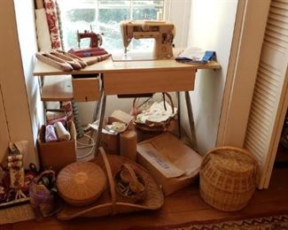 Old sewing machine, baskets, shuttles