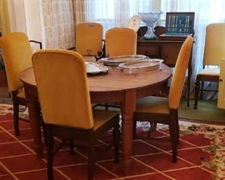 Table with six upholstered chairs