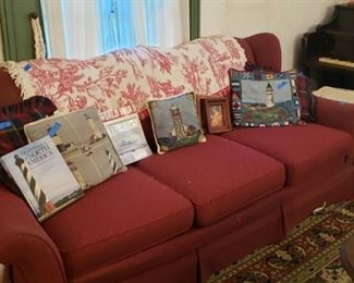 Sofa with light house collectibles