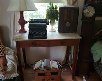 Marble top table; old radio;typewriter; etc.