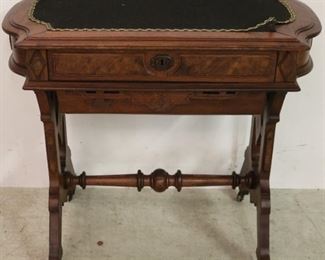 Victorian walnut highly carved sewing table