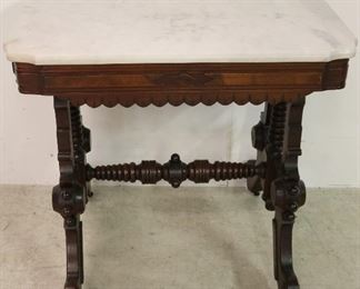 Victorian highly carved beveled marble top table