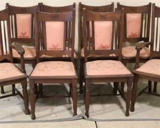 Set of 8 oak upholstered back chairs