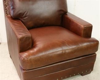 Tobacco leather chair by Leather Italia