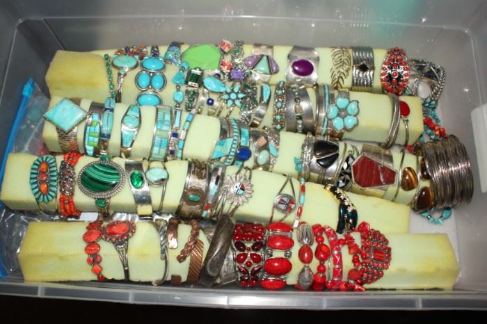 Over "90" Solid Sterling Silver cuffs and bracelets.  Some turquoise, coral, stone.   I will have hundreds and hundreds of rings, necklaces, bracelets and watches.   Many sterling. 