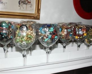 "Grab Cups" of jewelry pieces and some bits of sterling jewelry.  FUN!
