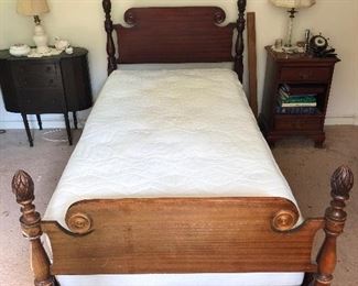 Antique vintage twin-sized bed.