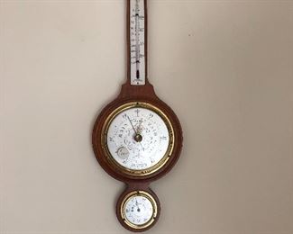 Antique, wall-hanging, barometer and thermometer.