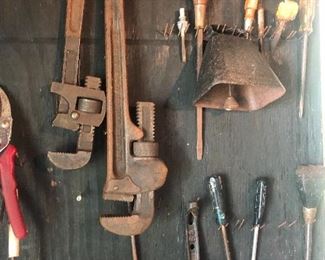 Old pipe wrenches and tools in the barn