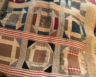 Many vintage hand-made quilts