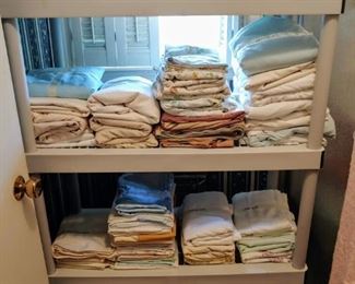 Lots of sheets towels and linens