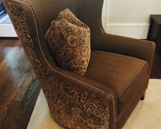Smith Brothers wingback chair with antique brass nailhead trim, finished in two fabrics, with down pillow